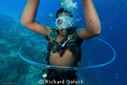 Diver swimming through his own bubble ring-Canon 5D MK II... by Richard Goluch 